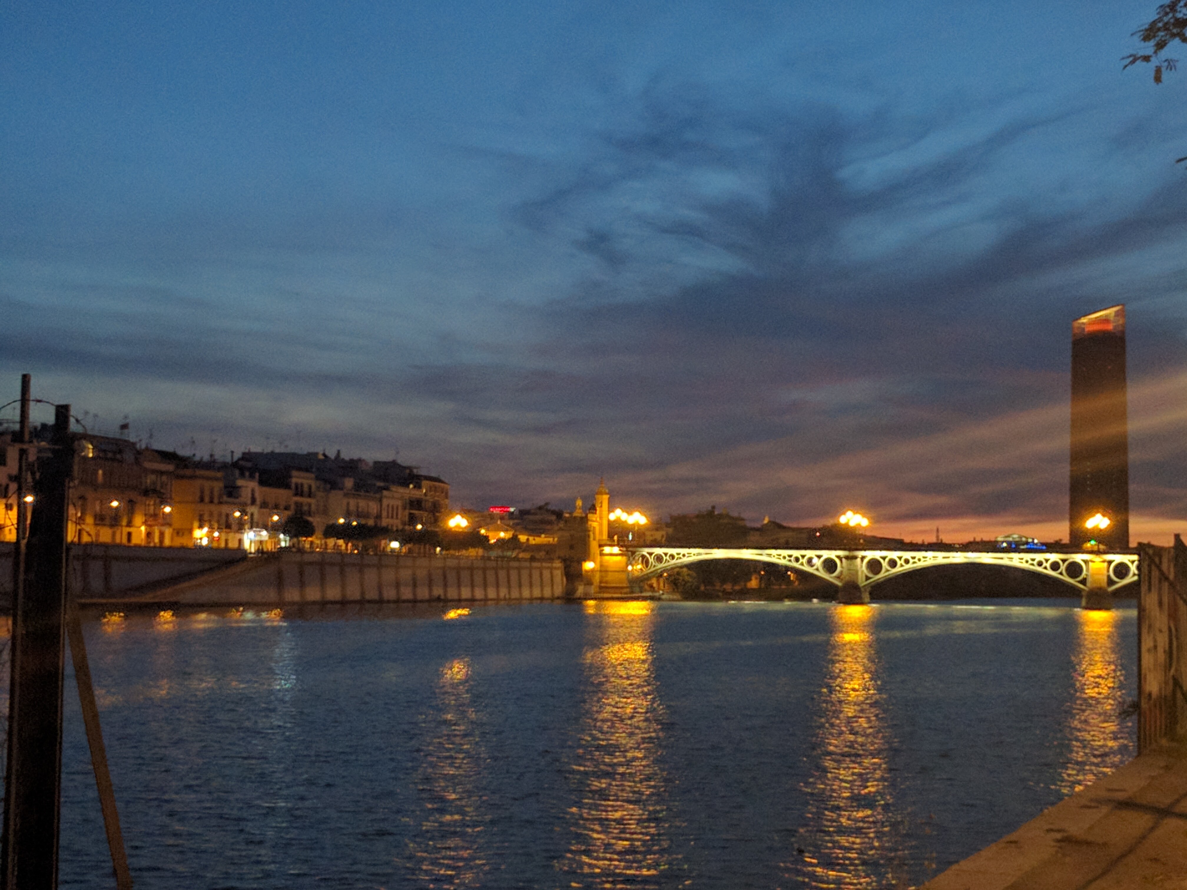 triana bridge at night